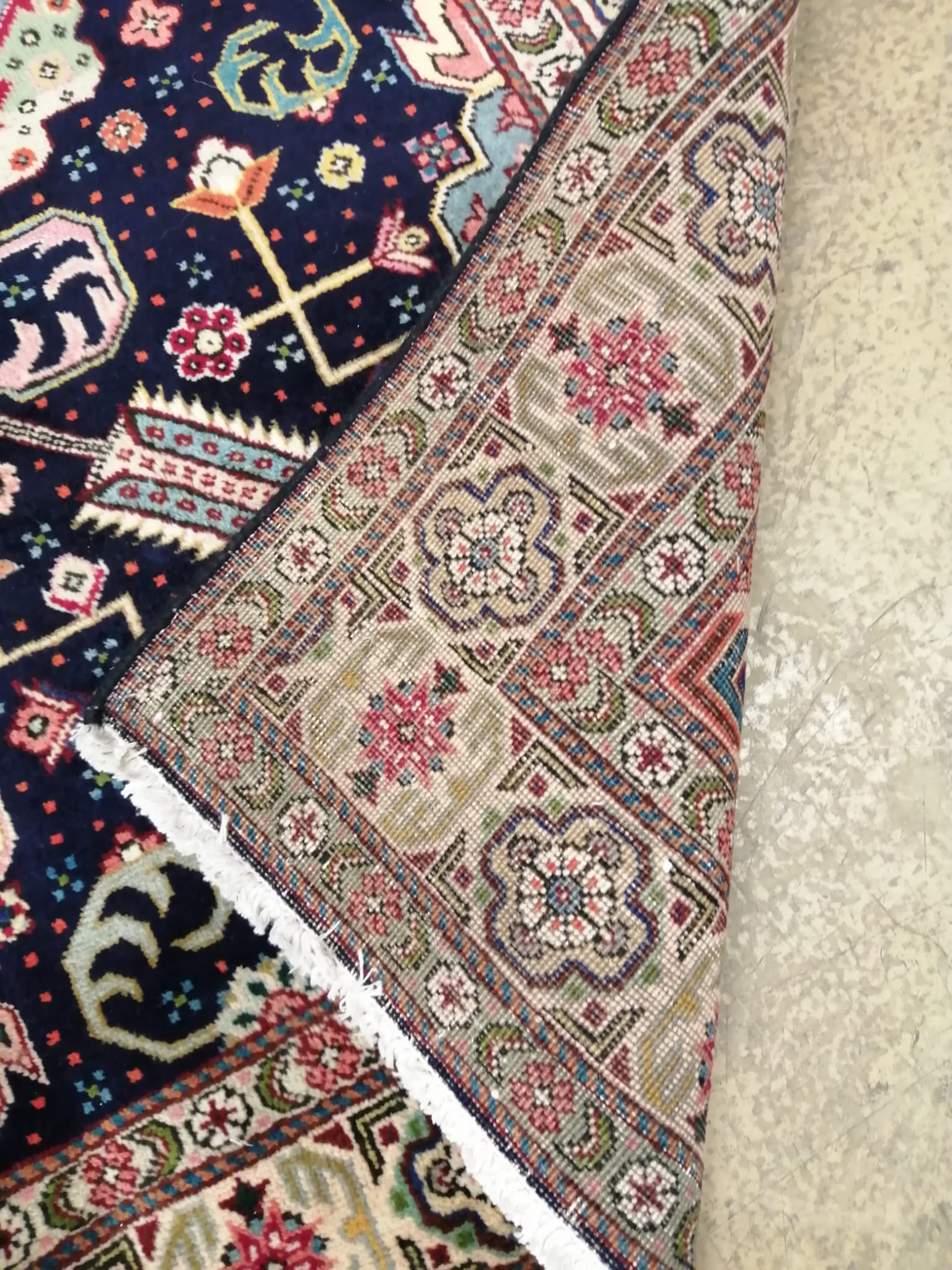 A Tabriz blue ground rug, 200 x 140cm